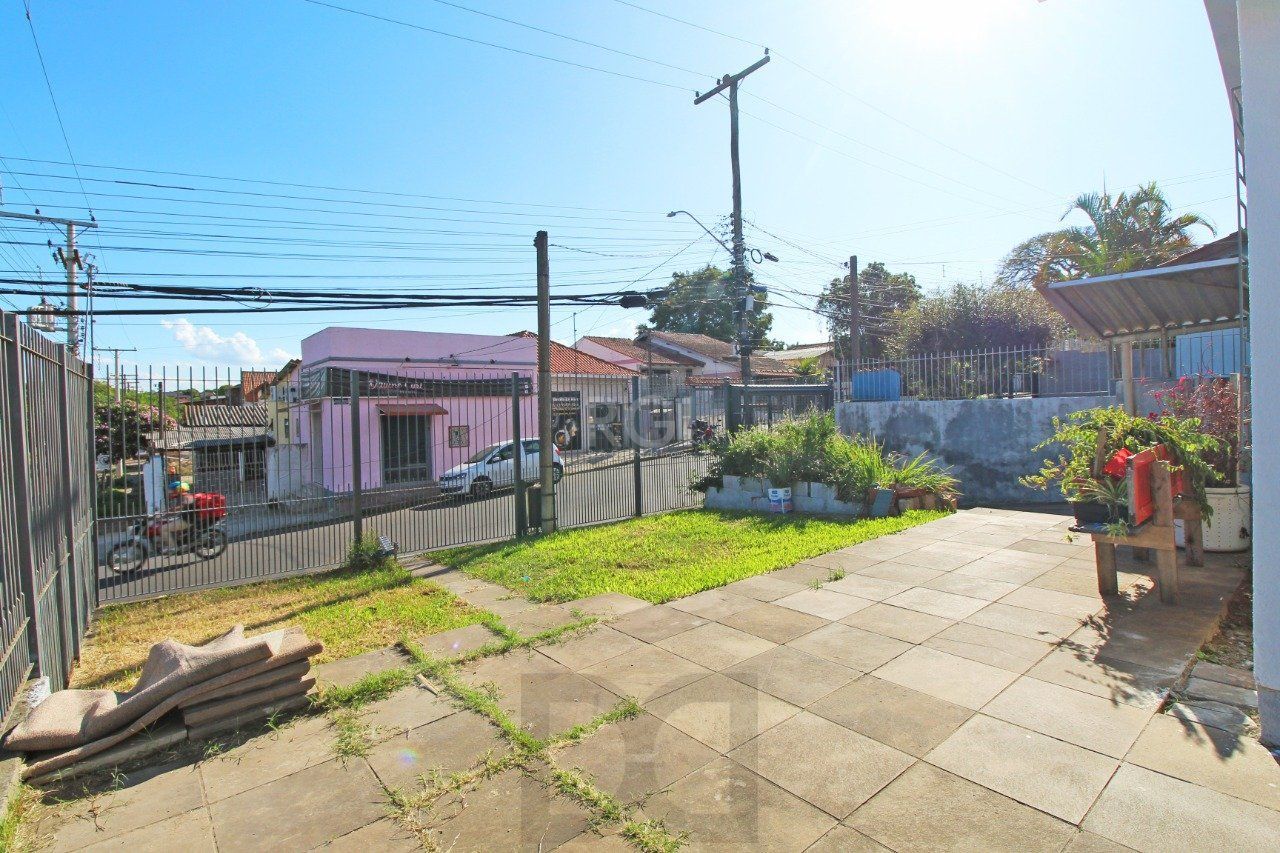 Casa 5 dormitórios, 1 suíte, 2 vagas de garagem, no bairro Camaquã, Poa/RS. — foto 4