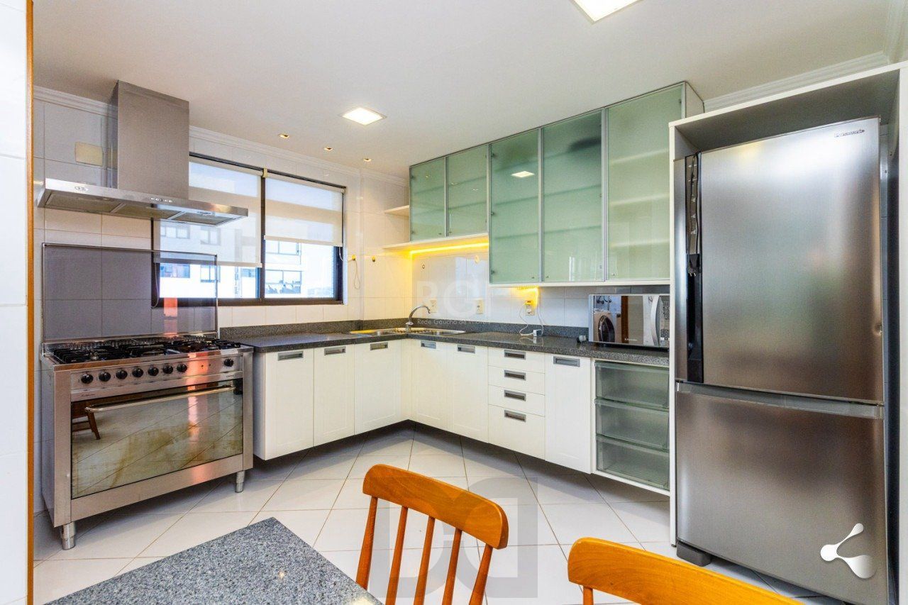 195m churrasqueira, 3 suites, 4 vagas semimobiliado no bairro Rio Branco, Poa/RS — foto 32