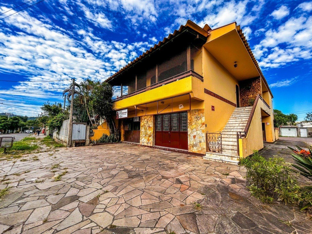 Casa de 3 Quartos, 1 suíte, garagem fechada, churrasqueira, na Cavalhada Poa/RS — foto 1