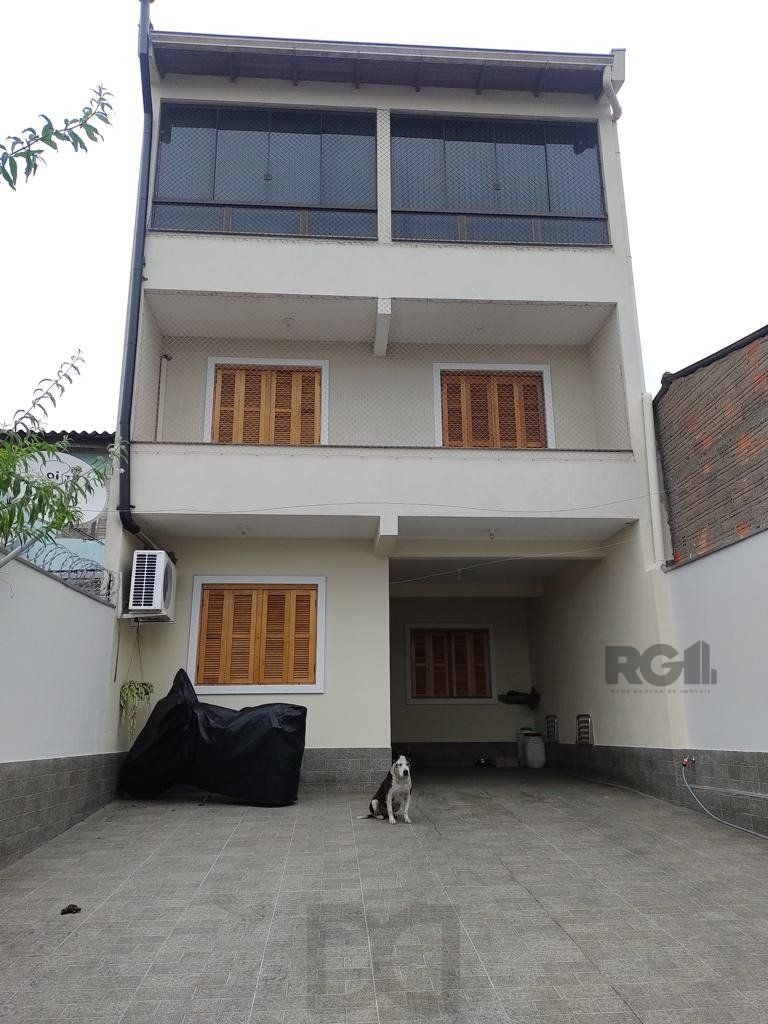 Casa 3 quartos, 4 vagas, salão de festa, sacada 198m² bairro Rubem Berta, Poa/RS — foto 1