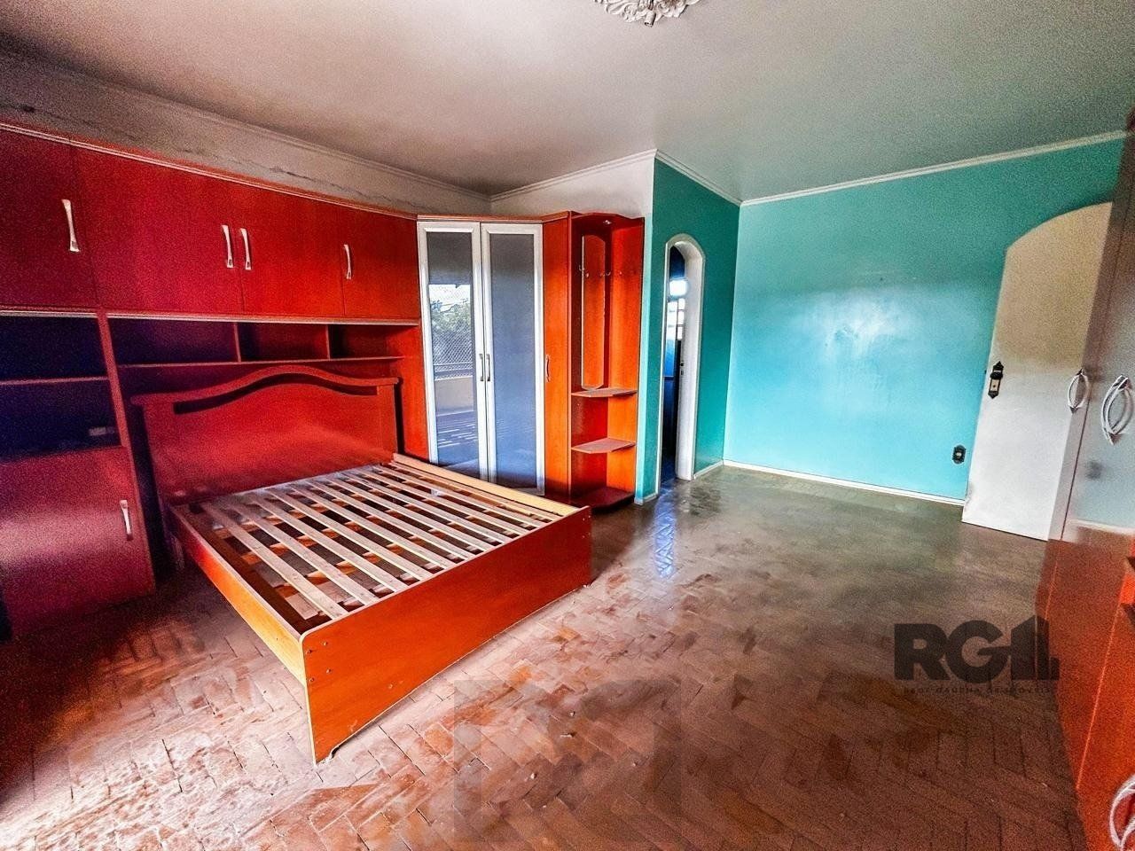 Casa com 2 salas comerciais, 3 quartos, vaga de garagem churrasqueira, suíte, no bairro Cavalhada, Porto Alegre/RS — foto 4