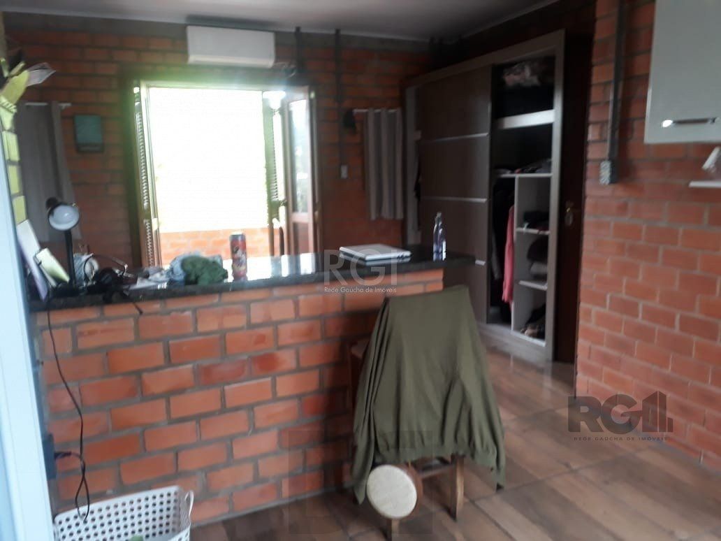 Casa com 3 dormitórios, sendo 1 suíte no bairro Hípica — foto 1