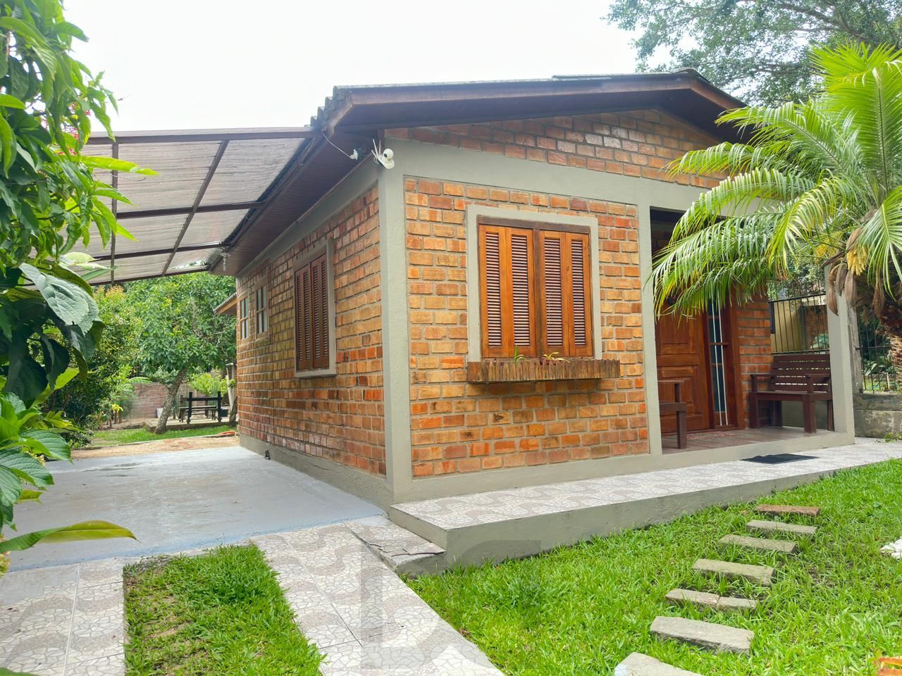 Casa de alvenaria toda reformada e mobiliada no bairro Lami — foto 2