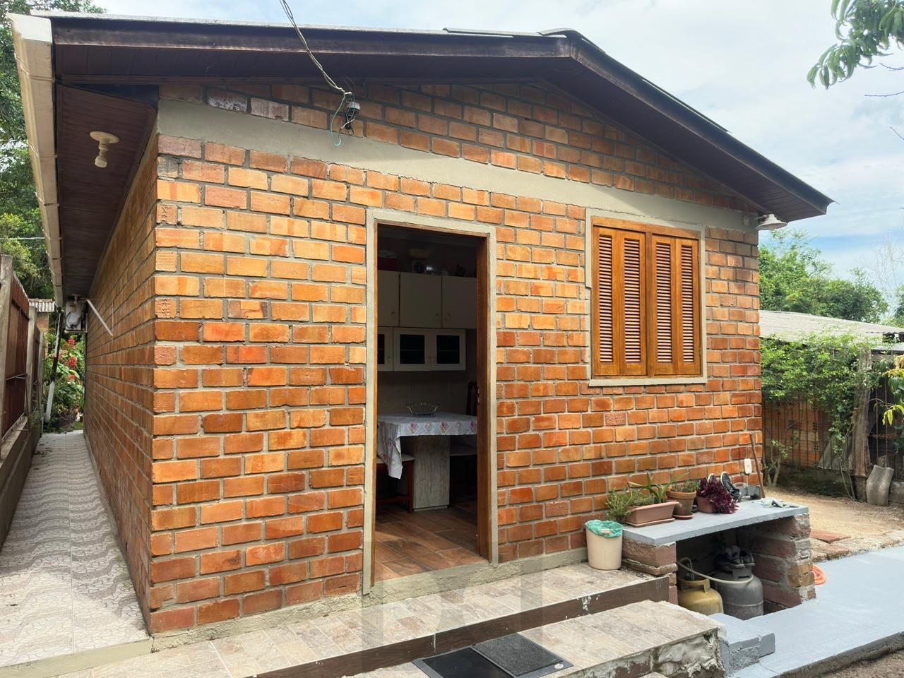 Casa de alvenaria toda reformada e mobiliada no bairro Lami — foto 17