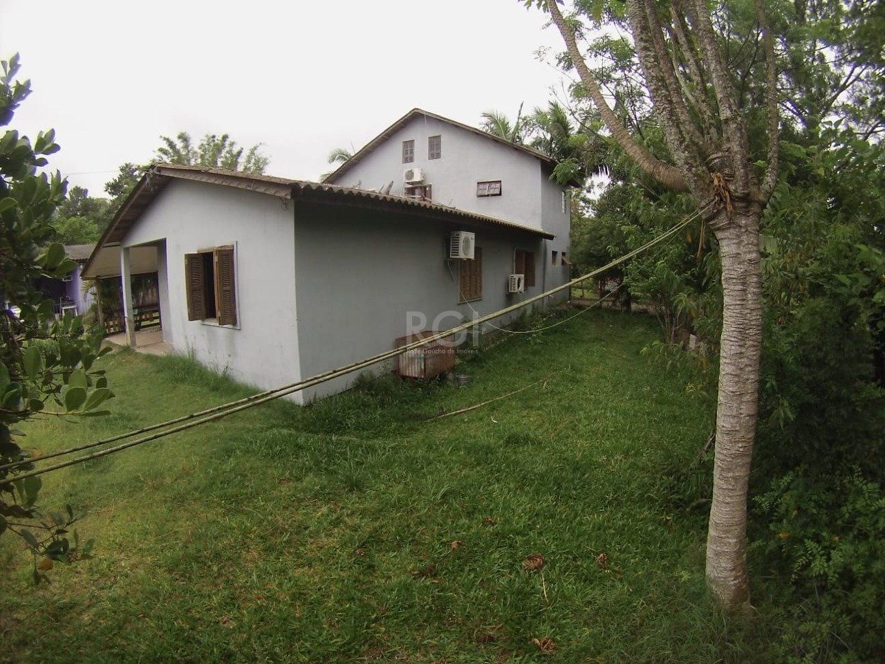 Casa 5 dormitórios no bairro Ponta Grossa — foto 1