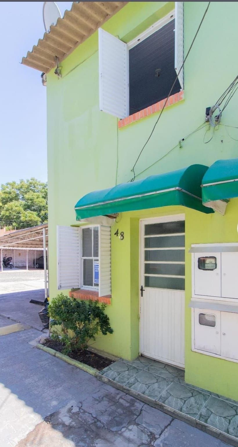 Casa aconchegante com 1 dormitório, suíte, vaga, no bairro São José em Poa/RS. — foto 1
