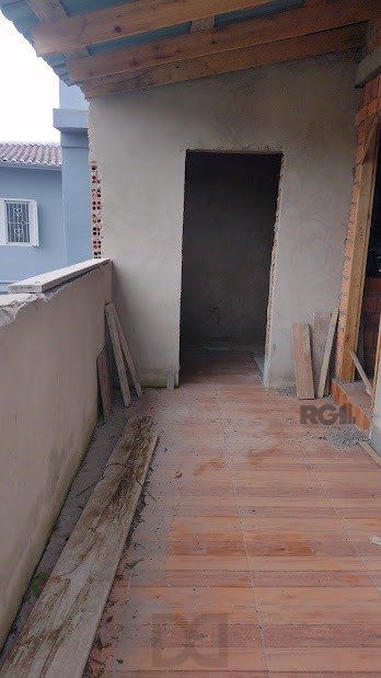Casa de dois dormitórios localizada no Bairro Nonoai — foto 2