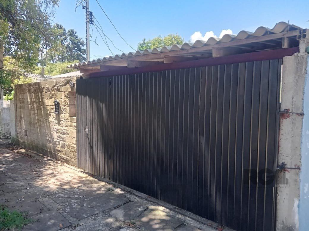 Casa com 2 dormitórios, vaga, amplo pátio, no bairro Santa Rosa de Lima, Poa/RS — foto 1