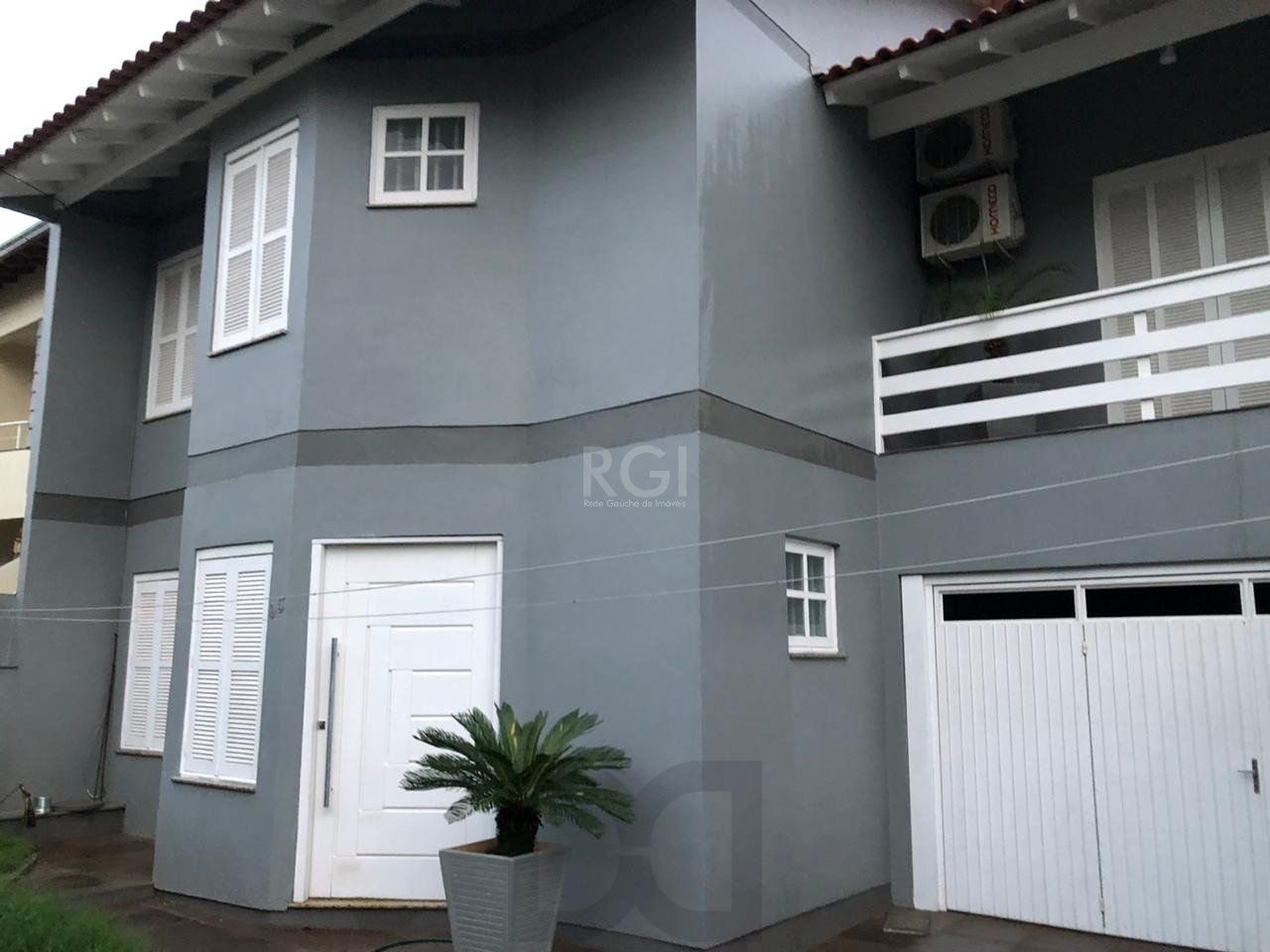 Casa 210m², 3 dormitórios, sendo 1 suites, 2 vagas - Mario Quintana, Porto Alegre/RS — foto 1