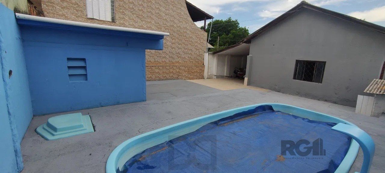 Casa com 2 quartos, vagas de garagem, piscina, bairro Sarandi, Porto Alegre/RS — foto 15