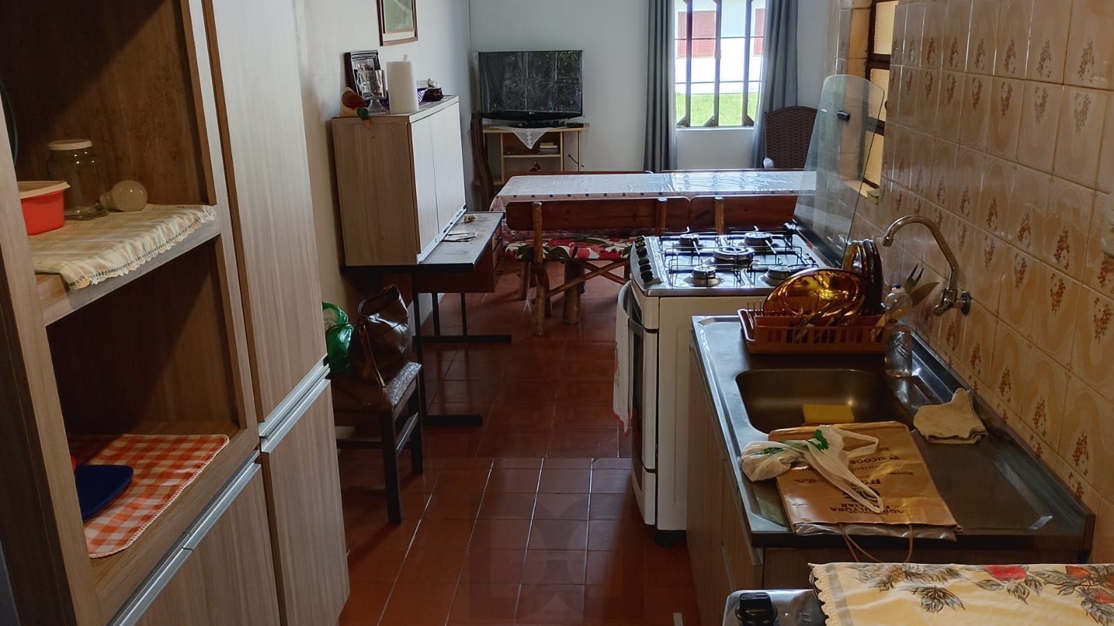 Casa térrea com 2 dormitórios na casa da frente e no fundos ,um galpão de alvenaria , churrasqueira ! — foto 6