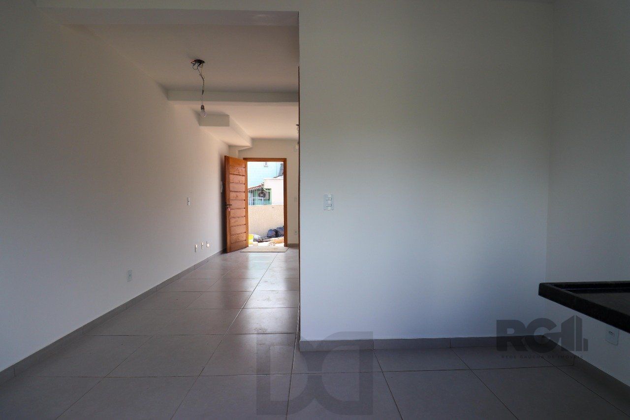 CASA ESTILO SOBRADO COM 2 QUARTOS E PÁTIO, À VENDA NO BAIRRO VILA NOVA, EM PORTO ALEGRE/RS — foto 19