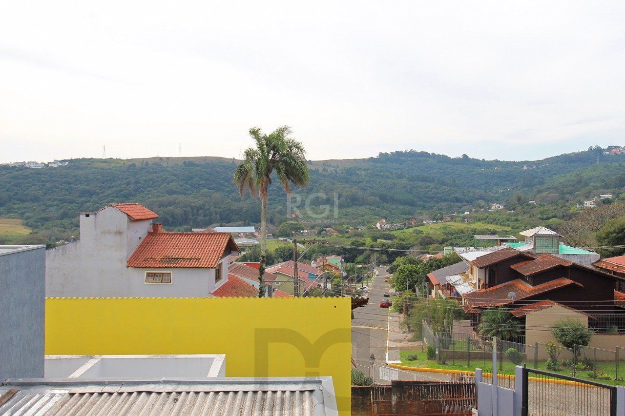 Casa para Venda - 339m², 3 dormitórios, 2 vagas - Vila Nova, Porto Alegre — foto 1