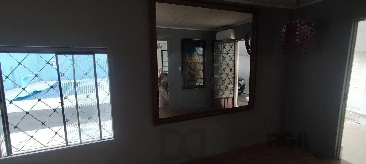 Casa com 2 quartos, vagas de garagem, piscina, bairro Sarandi, Porto Alegre/RS — foto 2