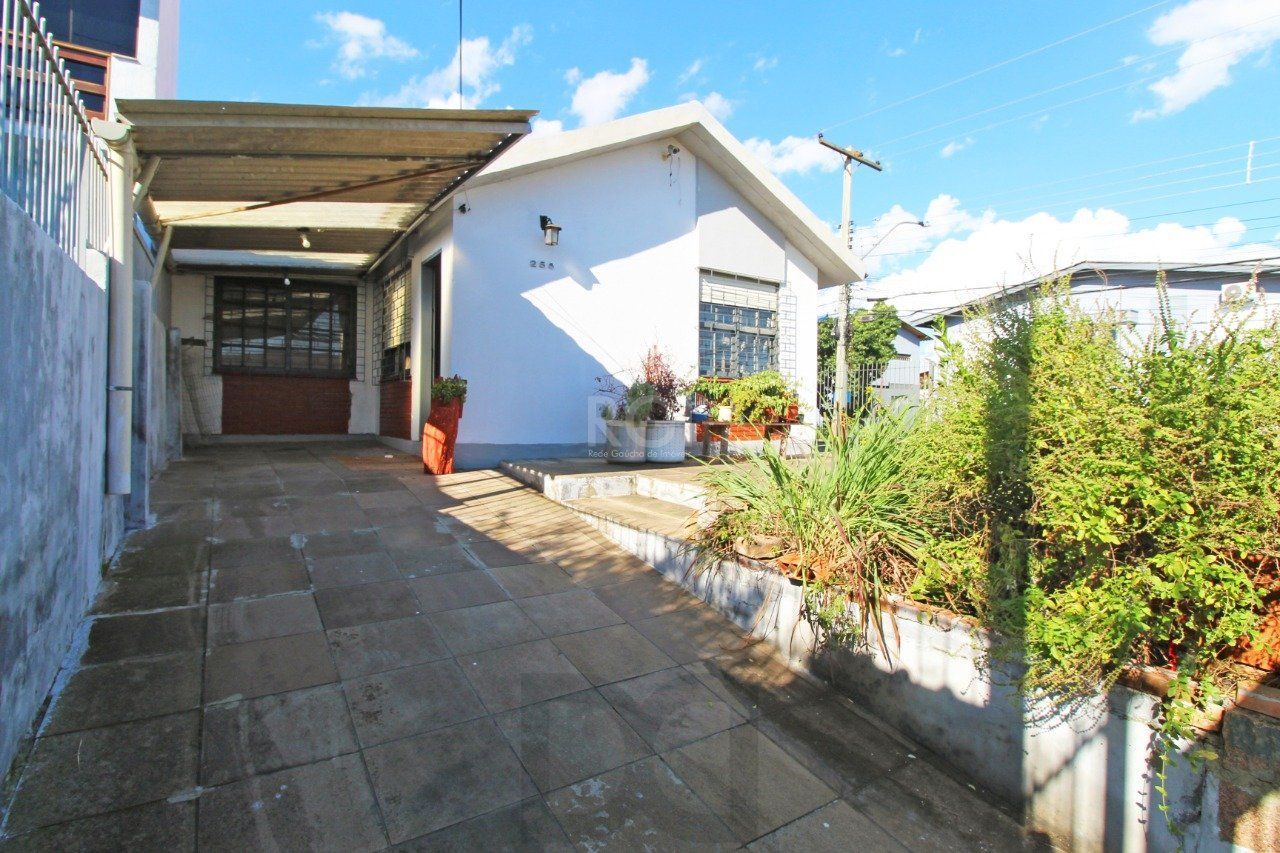Casa 5 dormitórios, 1 suíte, 2 vagas de garagem, no bairro Camaquã, Poa/RS. — foto 2