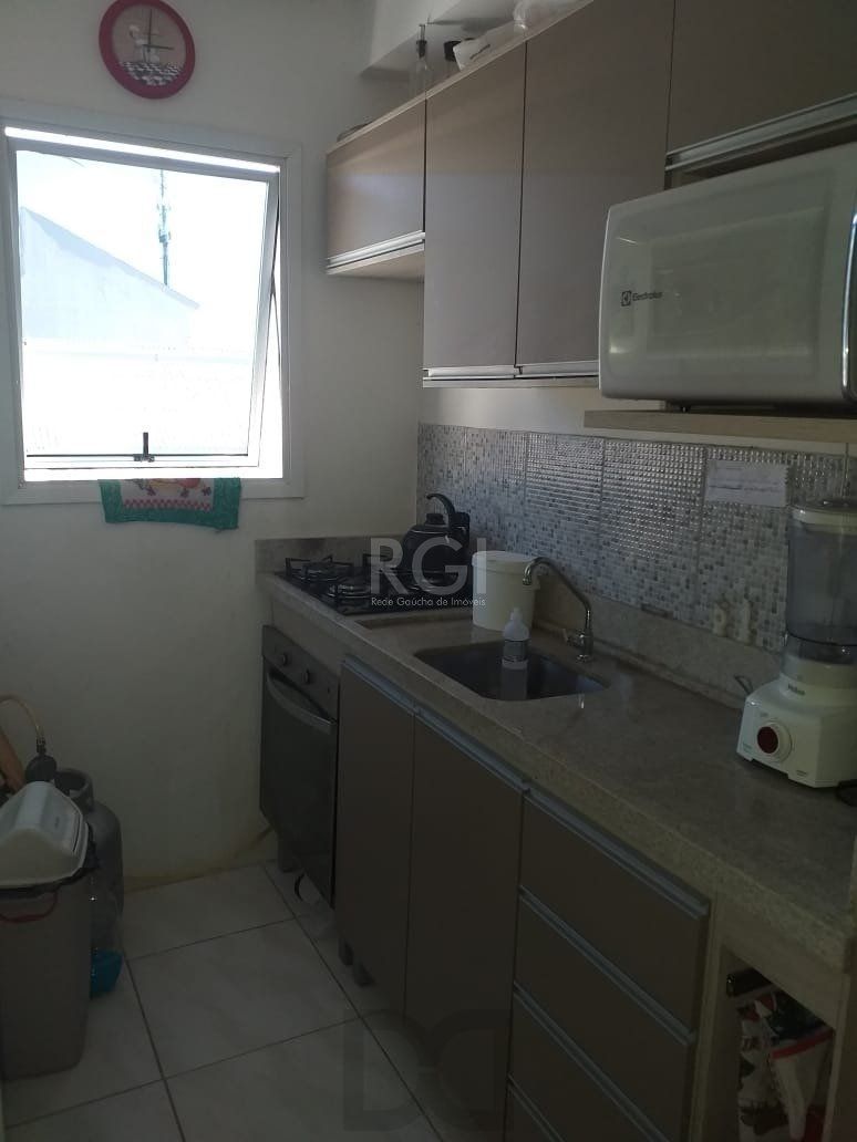 Casa com 2 quartos, banheiro, área de serviço, cozinha, vaga de garagem, no bairro Aberta dos Morros/RS — foto 8
