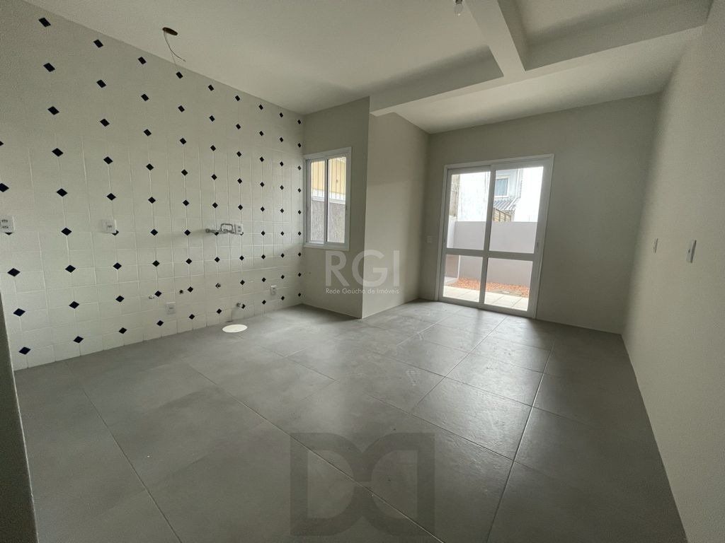 Casa 3 dormitórios, sendo 1 suites, 2 vagas - Guarujá, Porto Alegre RS — foto 5