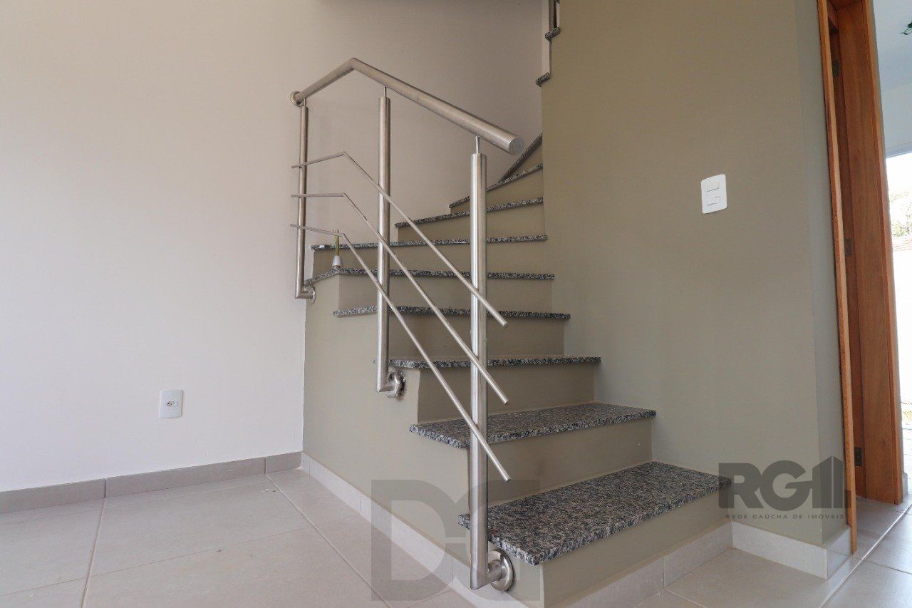 CASA ESTILO SOBRADO COM 2 QUARTOS E PÁTIO, À VENDA NO BAIRRO VILA NOVA, EM PORTO ALEGRE/RS — foto 21