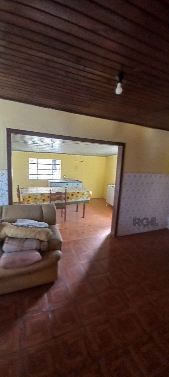 Oportunidade na zona sul, terreno com duas casas, 03 dormitórios e cozinha com churrasqueira. — foto 7