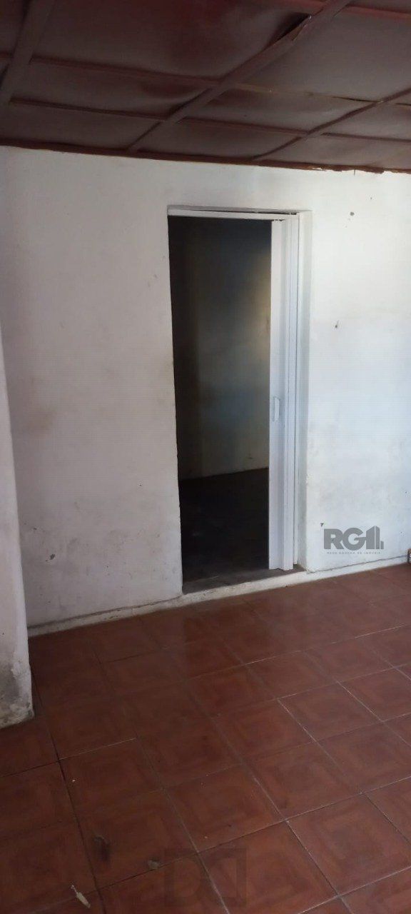 Oportunidade na zona sul, terreno com duas casas, 03 dormitórios e cozinha com churrasqueira. — foto 10