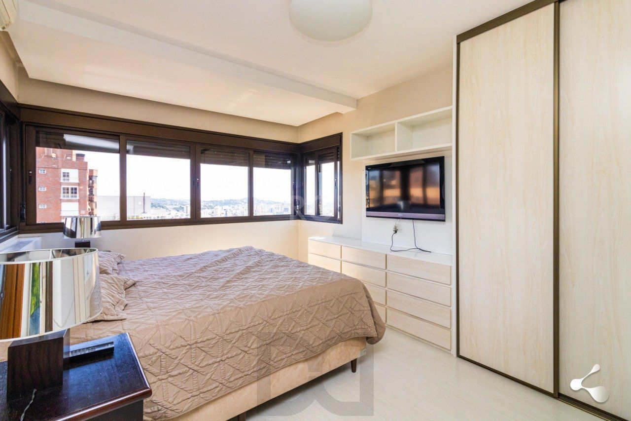 195m churrasqueira, 3 suites, 4 vagas semimobiliado no bairro Rio Branco, Poa/RS — foto 25