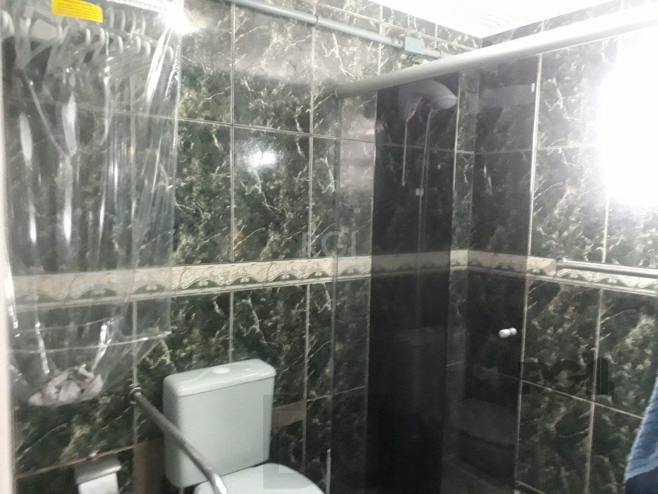Casa com 3 dormitórios, sendo 1 suíte no bairro Hípica — foto 12