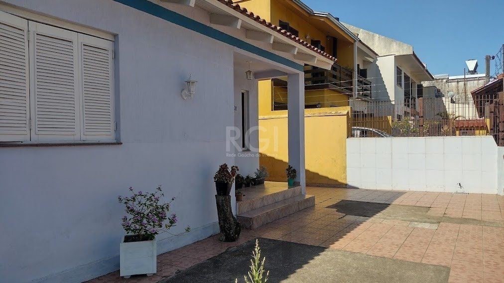 Casa 3 Quartos, 3 vagas de garagem, Bairro Cavalhada, Porto Alegre-RS. — foto 1