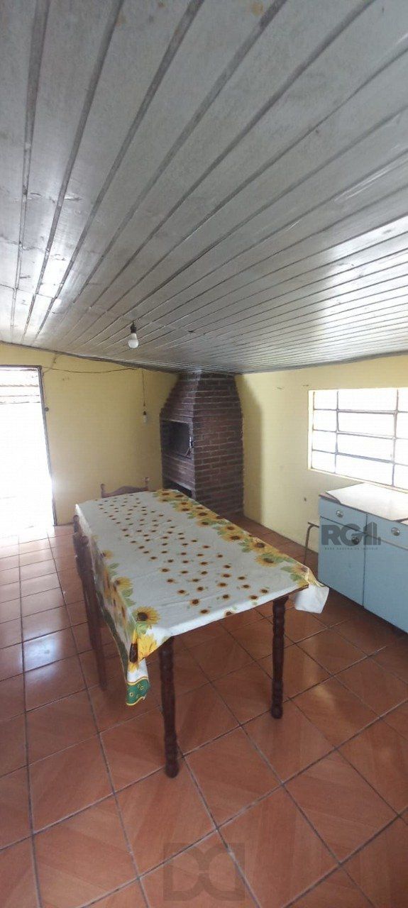 Oportunidade na zona sul, terreno com duas casas, 03 dormitórios e cozinha com churrasqueira. — foto 8