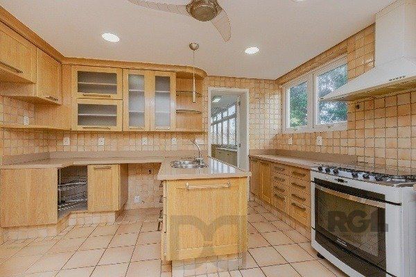 Vende-se luxuoso apartamento 3 quartos c/ suíte, dependência de empregada, gabinete, 2 vagas cobertas - 283m² - Moinhos de Vento — foto 12