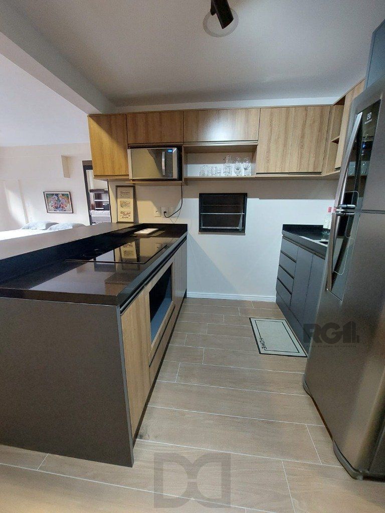 Apartamento stidio com 1 dormitório, 1 vaga de garagem no Bairro Auxiliadora. — foto 13