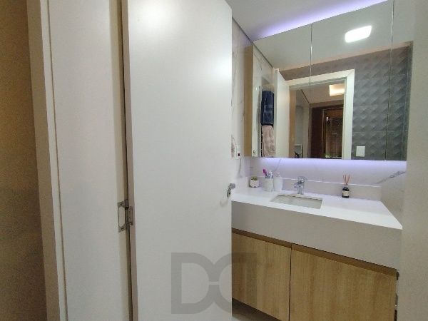 Vende-se apartamento reformado com 2 dormitórios (1 suíte) - 75 m² - Jardim Botânico — foto 17
