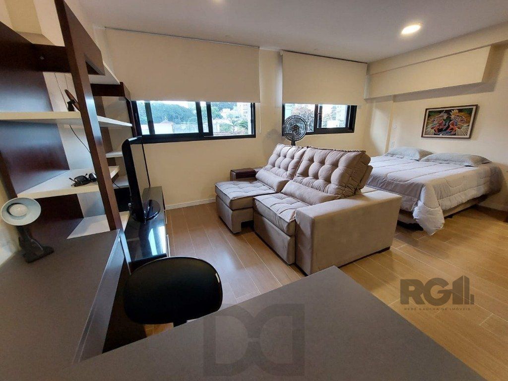 Apartamento stidio com 1 dormitório, 1 vaga de garagem no Bairro Auxiliadora. — foto 1
