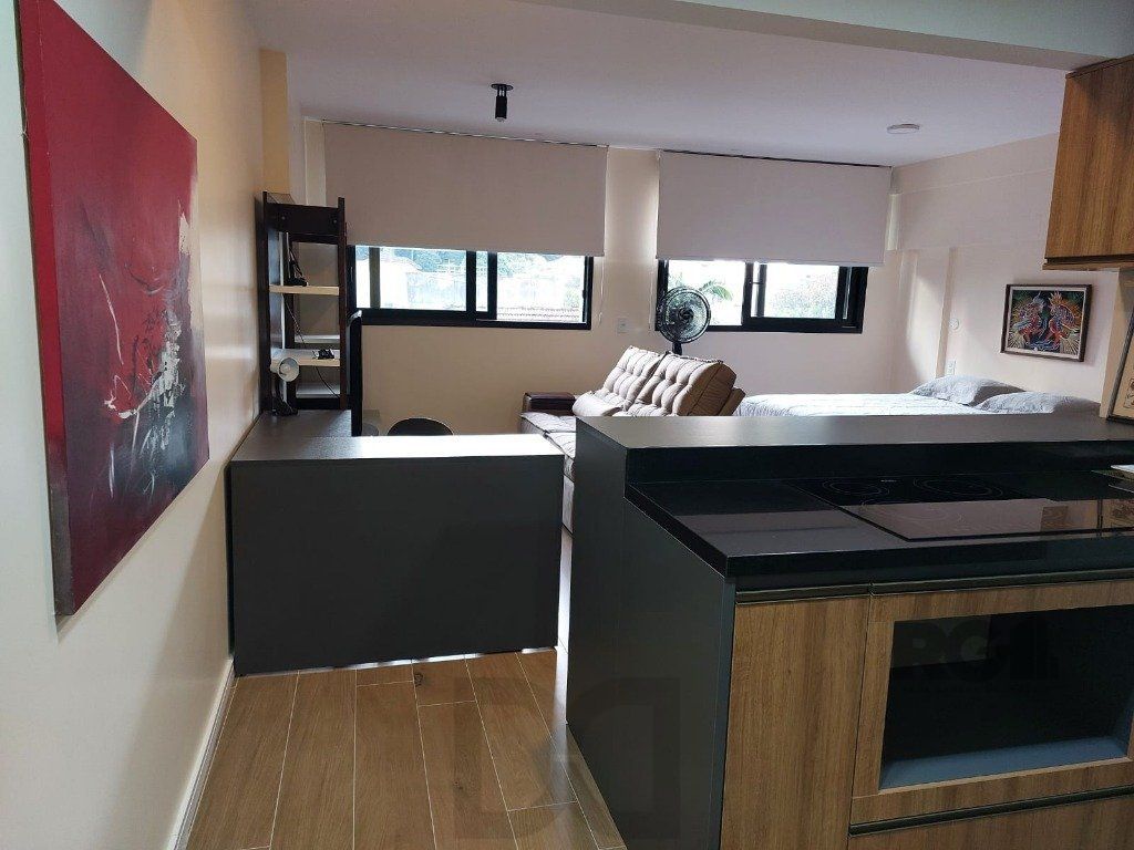 Apartamento stidio com 1 dormitório, 1 vaga de garagem no Bairro Auxiliadora. — foto 10