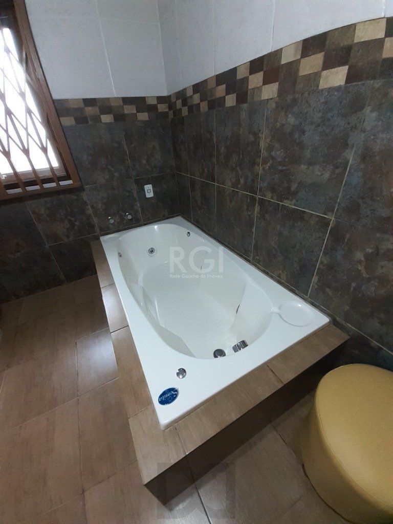 Casa 3 dormitórios, 2 suítes, 4 vagas, 257,52 m² de área privativa, no Bairro Ipanema — foto 30
