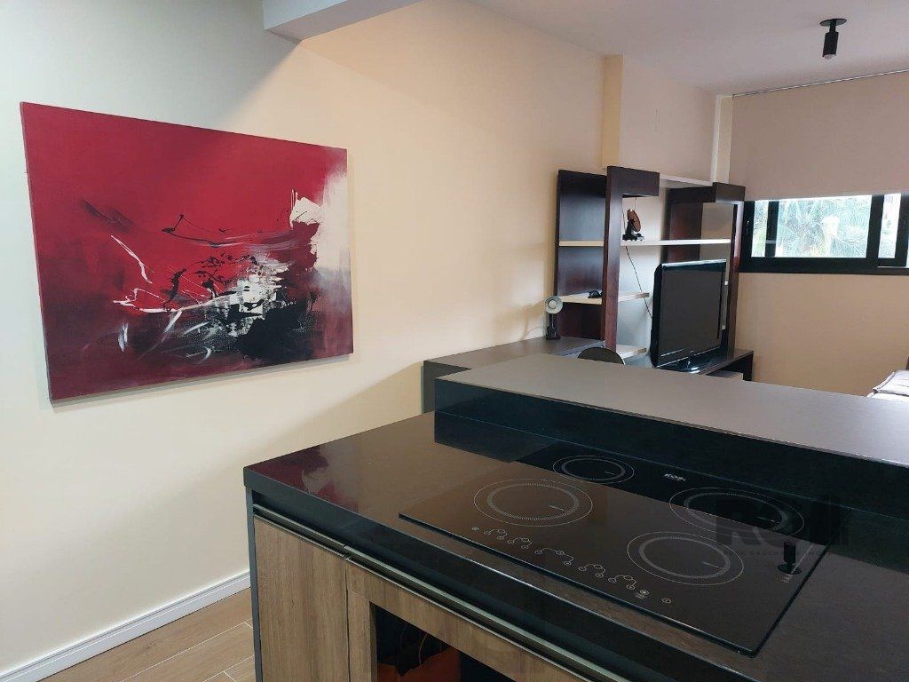 Apartamento stidio com 1 dormitório, 1 vaga de garagem no Bairro Auxiliadora. — foto 11