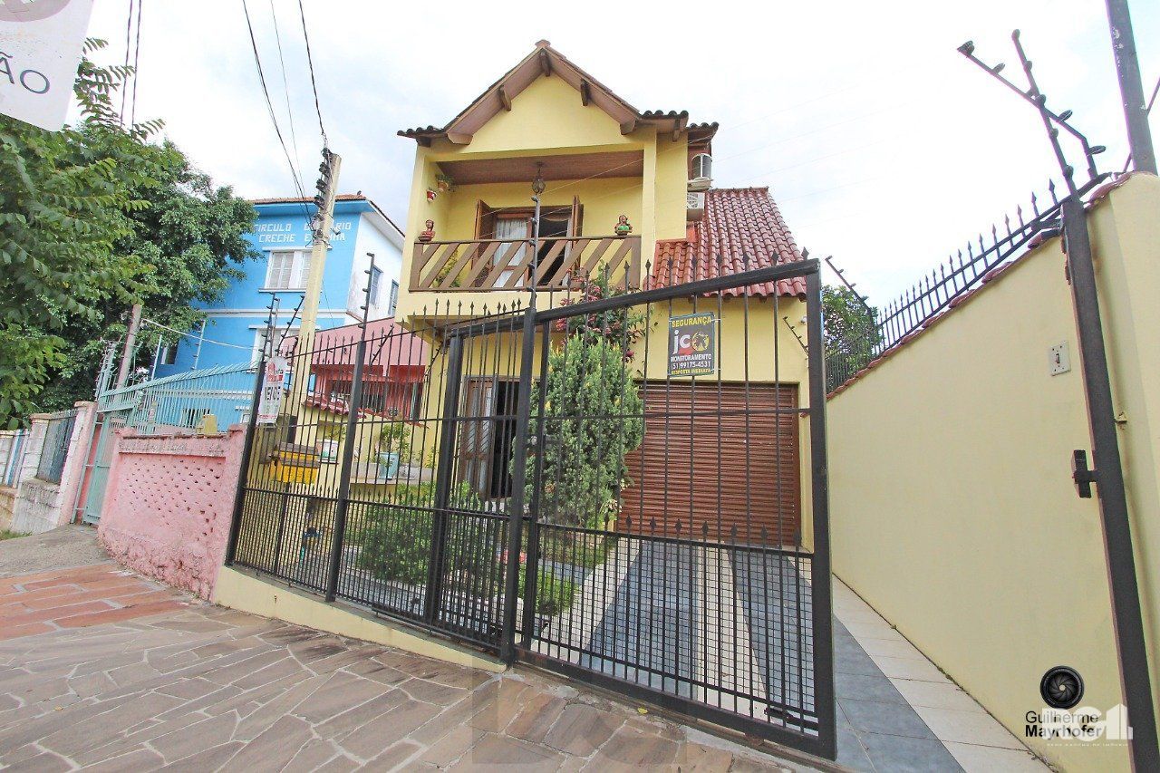 Casa com 3 dormitórios, sendo 1 suíte, com vaga para 2 carros, no bairro Medianeira, Porto Alegre, RS — foto 25