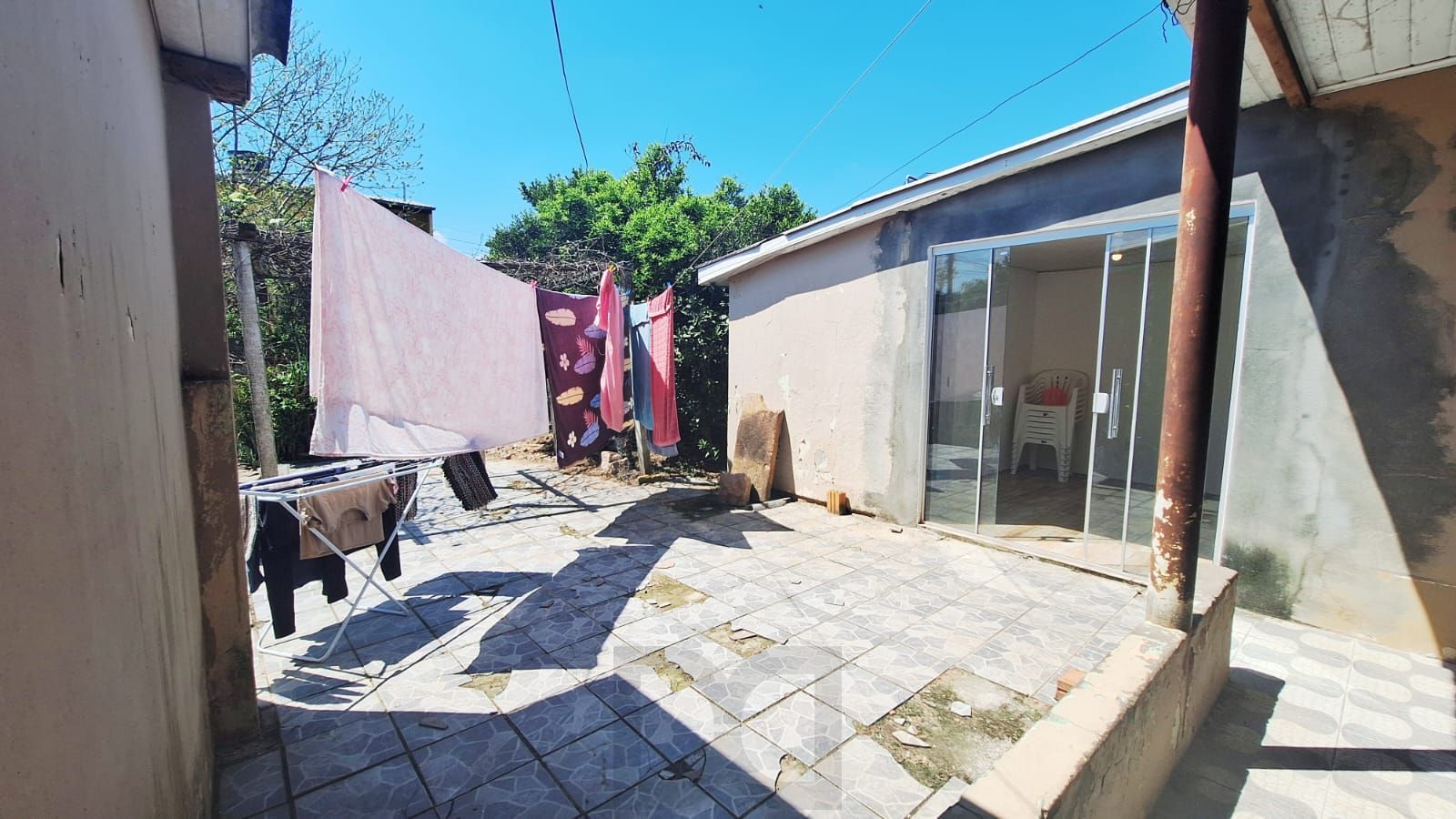 Se você procura uma casa com pátio e churrasqueira para receber sua família e amigos , aqui é seu lugar! — foto 13