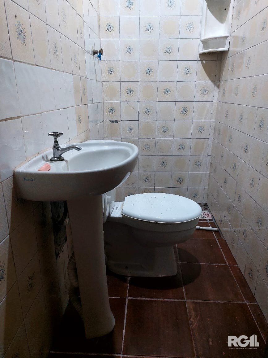Casa com 3 dormitórios, sendo 1 suíte, 3 vagas, no bairro Nonoai, Porto Alegre, RS — foto 50