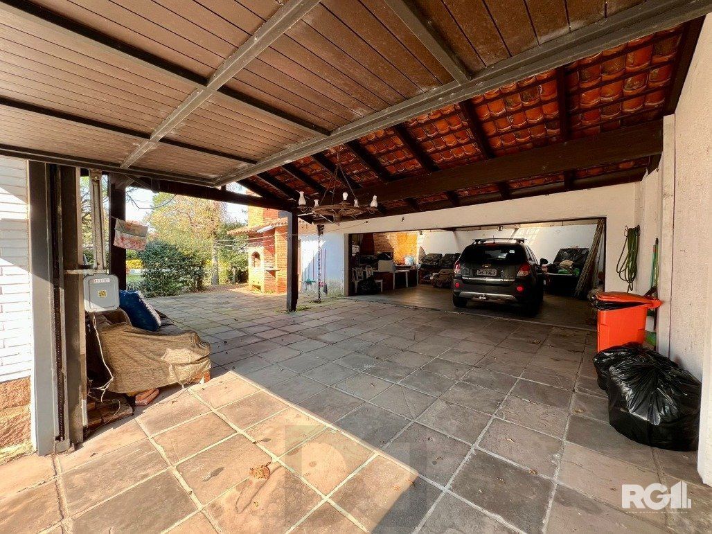 Casa térrea, com 3 dormitórios, sendo 2 suítes, 5 vagas, piscina, no bairro Ipanema, em Porto Alegre, RS — foto 14
