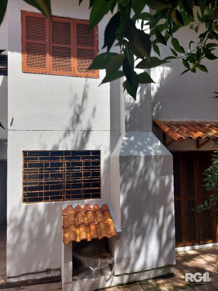 Casa com 3 dormitórios, sendo 1 suíte, 3 vagas, no bairro Nonoai, Porto Alegre, RS — foto 55