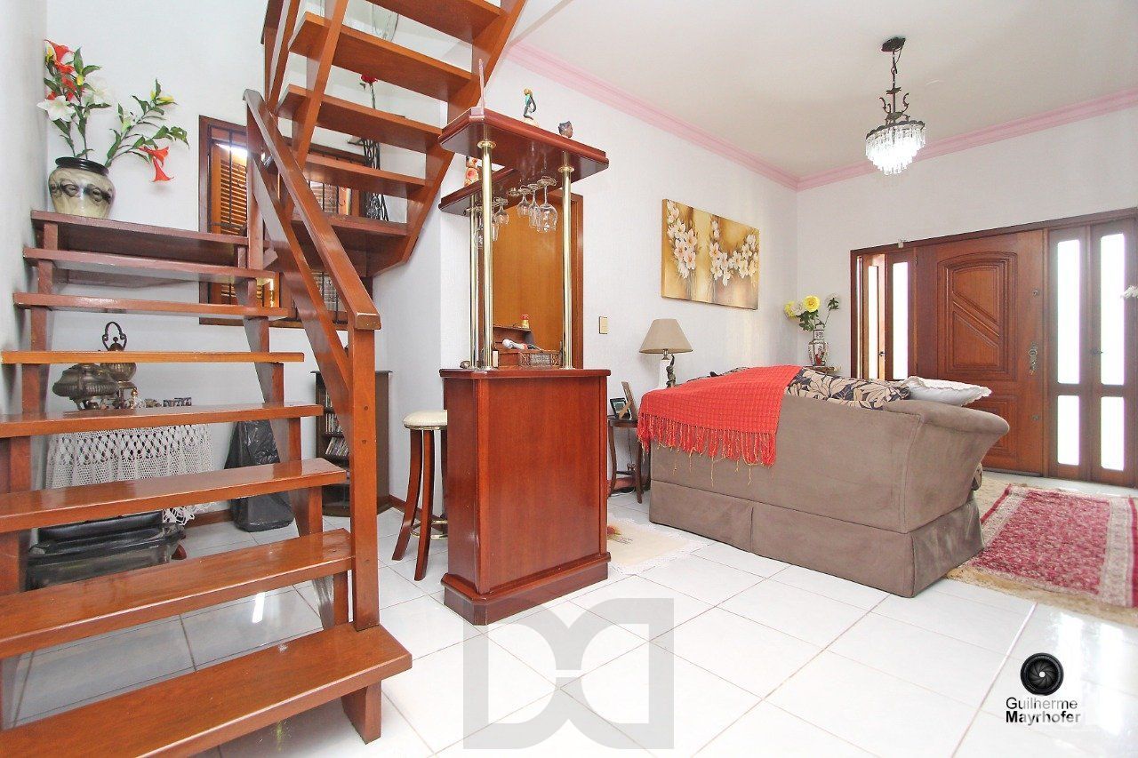 Casa com 3 dormitórios, sendo 1 suíte, com vaga para 2 carros, no bairro Medianeira, Porto Alegre, RS — foto 9