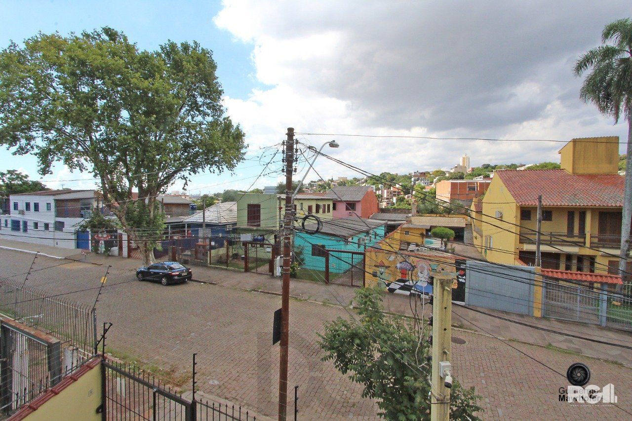 Casa com 3 dormitórios, sendo 1 suíte, com vaga para 2 carros, no bairro Medianeira, Porto Alegre, RS — foto 18