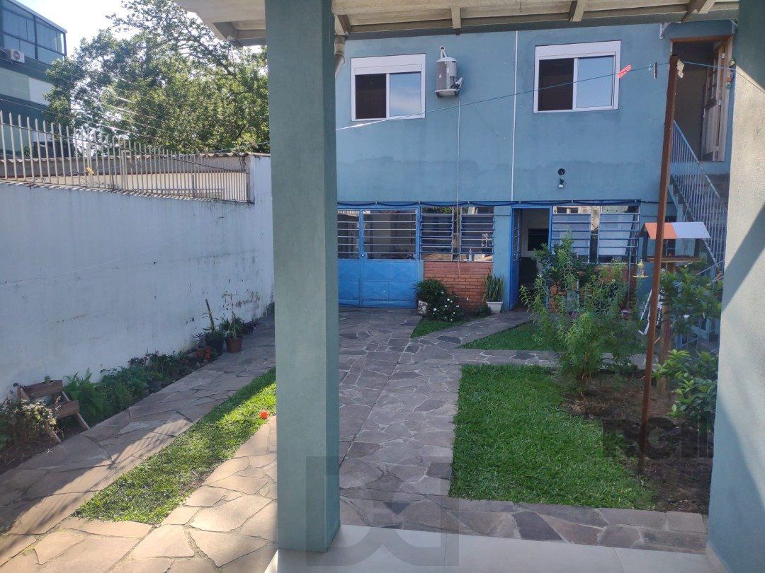 Casa com 250m², 2 quartos, 1 suite, edícula, no bairro Nonoai — foto 14