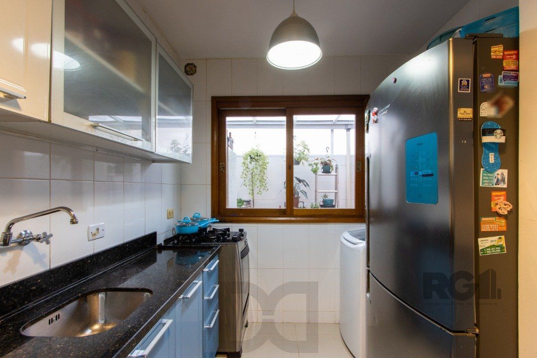 Excelente oportunidade de casa à venda em condomínio fechado no Reserva Guarujá, localizado na Avenida da Serraria em Porto Alegre. — foto 16