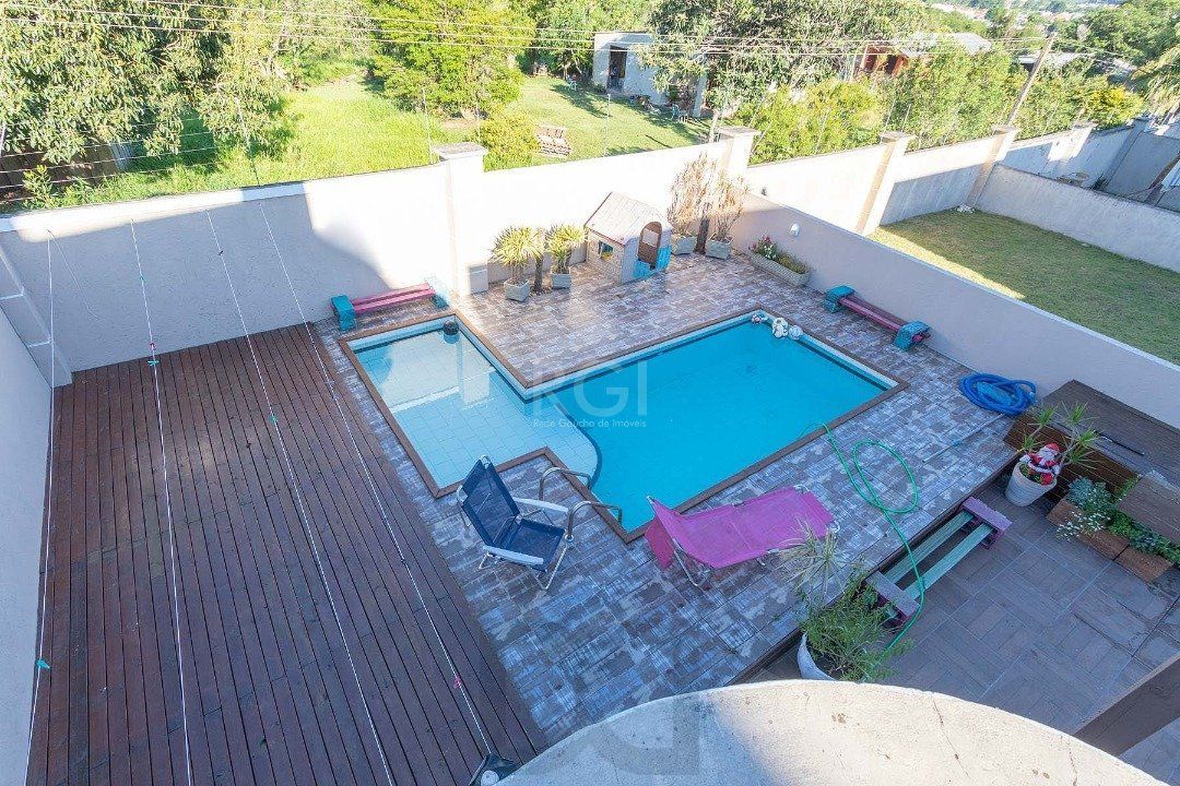 Casa para Venda com 4 dormitórios no bairro Hípica — foto 29