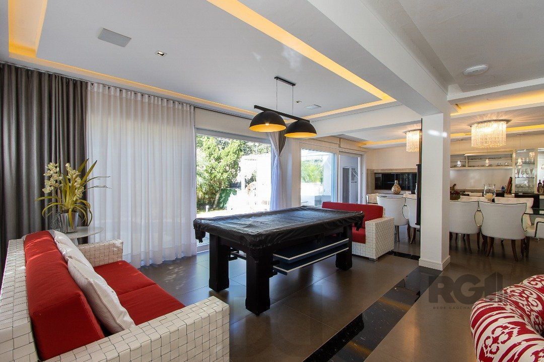 Casa no Condomínio Las Rocas, vista para o Guaíba, com 5 suítes — foto 15