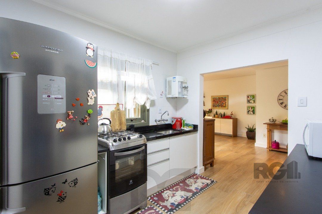 Casa térrea, 3 quartos, edícula, com 2 suites, pátio - Bairro Guarujá — foto 13