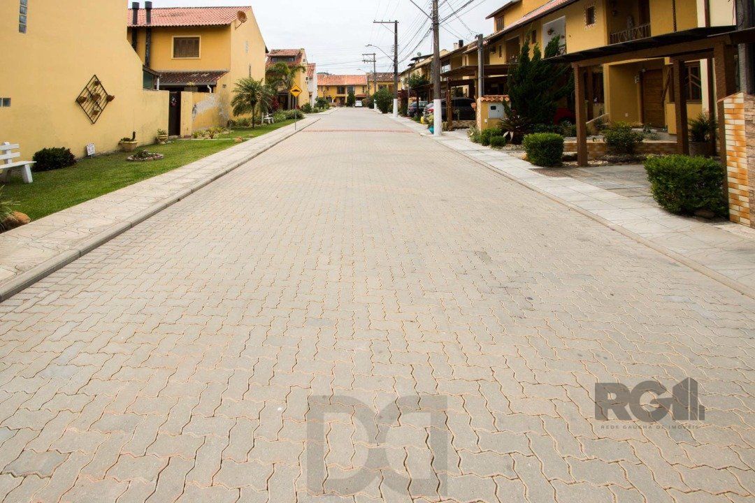 Casa em Condomínio na Zona Sul, no bairro Hípica, com 2 dormitórios, living para dois ambientes, cozinha mobiliada, lavabo — foto 42