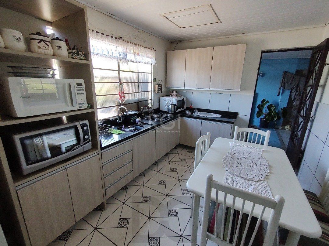 Casa para Venda - 100m², 3 dormitórios, 2 vagas - Lomba do Pinheiro — foto 5