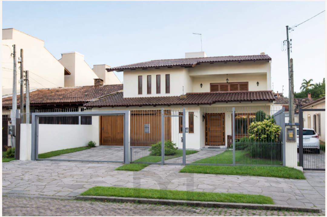 Casa à venda com 5 dormitórios, 392m² e 4 vagas no bairro Vila Assunção, Zona Sul de Porto Alegre — foto 4